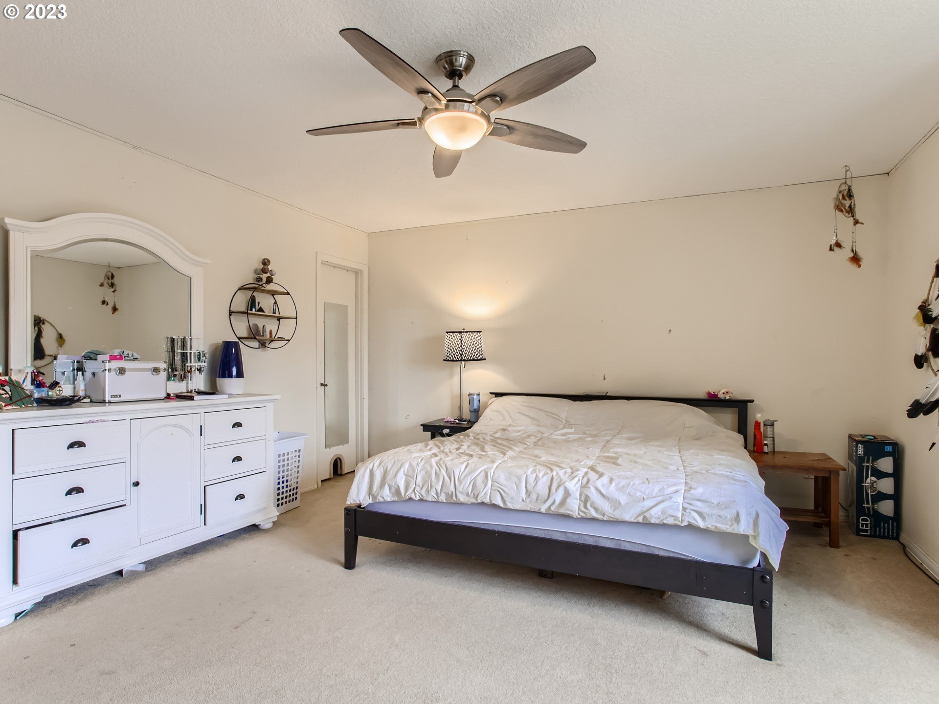 3120 Southwest Orchard Place Gresham, OR 97080 - Photo 12 of 27 a bedroom with a bed and a dresser