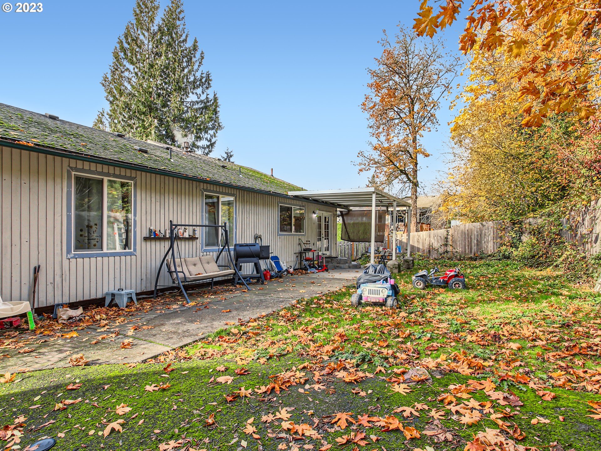 3120 Southwest Orchard Place Gresham, OR 97080 - Photo 25 of 27 a view of a house with backyard and sitting area