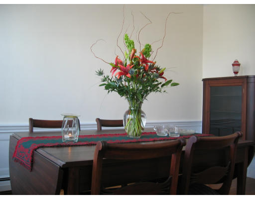 28 Addington Road, Unit 2 Brookline, MA 02445 - Photo 12 of 14 a room with a table chair and a potted plant