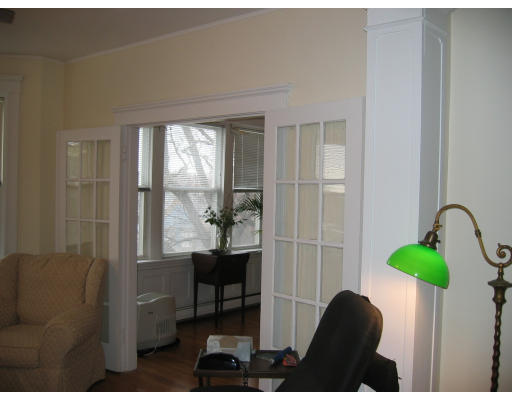 28 Addington Road, Unit 2 Brookline, MA 02445 - Photo 9 of 14 a dining room with furniture and a window
