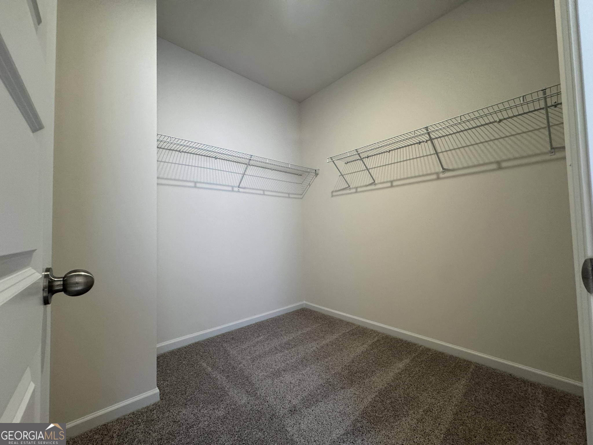 190 Fair Oak Lane Calhoun, GA 30701 - Photo 20 of 30 a view of a room with racks on the wall