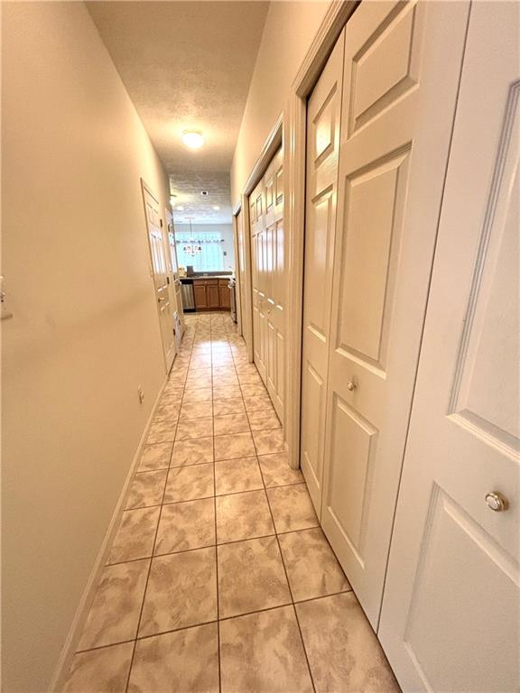 516 Madison Boulevard Freedom, PA 15042 - Photo 30 of 33 Hallway for access to 3 large storage closets and pantry