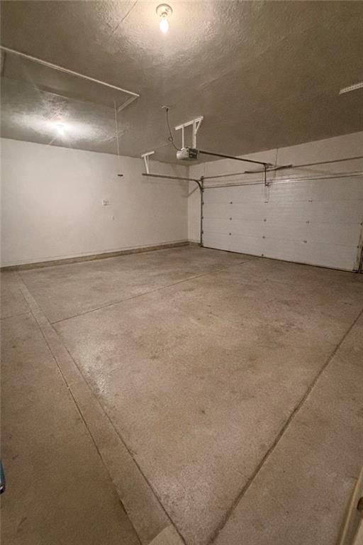 516 Madison Boulevard Freedom, PA 15042 - Photo 33 of 33 Spacious 2 car garage with pull down ladder to attic storage area