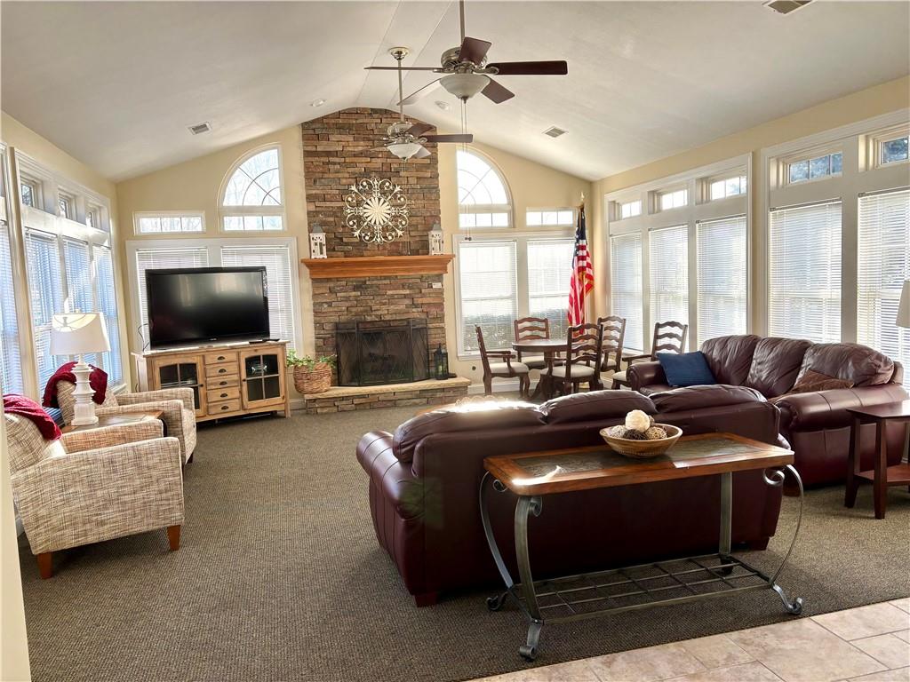 516 Madison Boulevard Freedom, PA 15042 - Photo 35 of 36 a living room with furniture and a flat screen tv