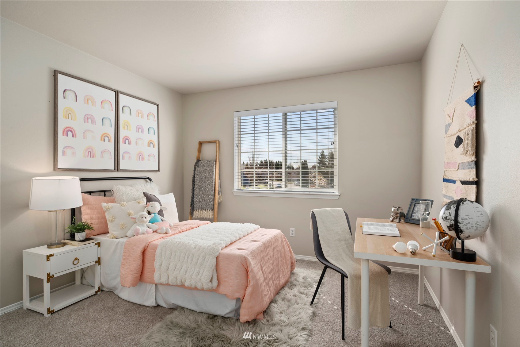 4518 Northeast 7th Place Renton, WA 98059 - Photo 14 of 24 a bedroom with a bed and a window