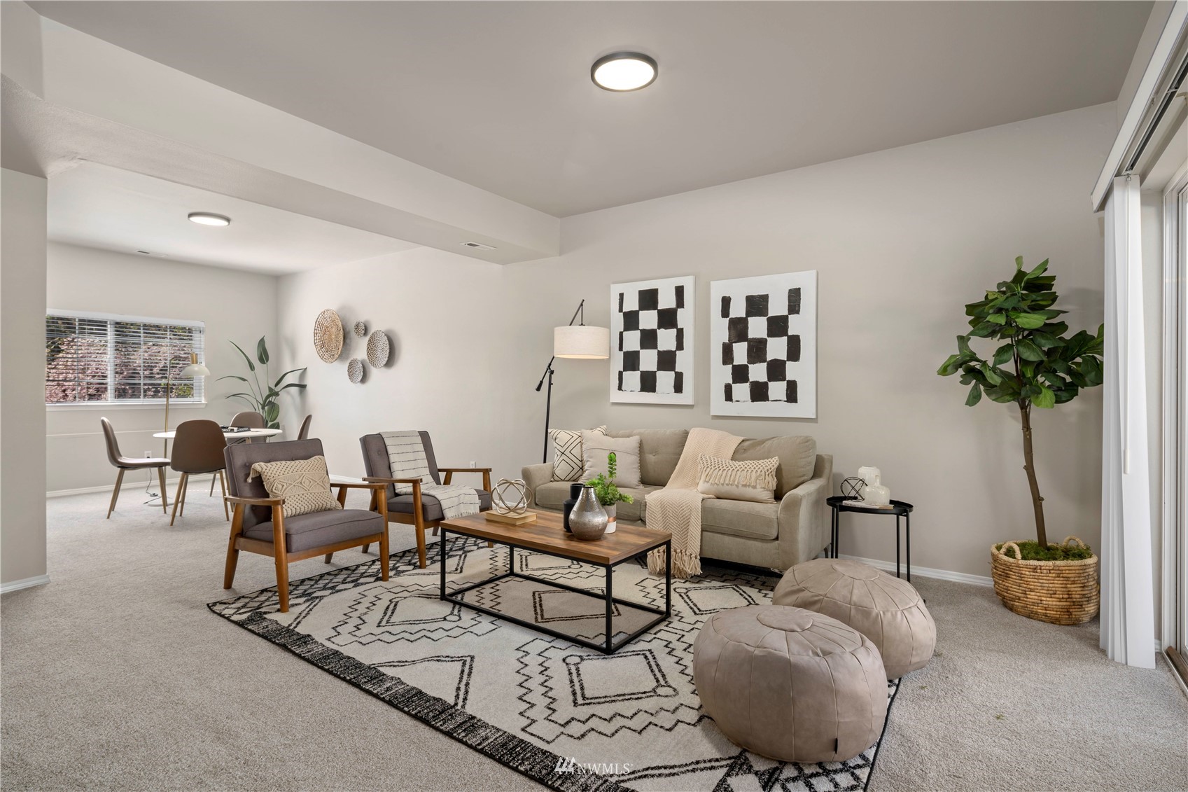 4518 Northeast 7th Place Renton, WA 98059 - Photo 17 of 24 a living room with furniture potted plant and a window