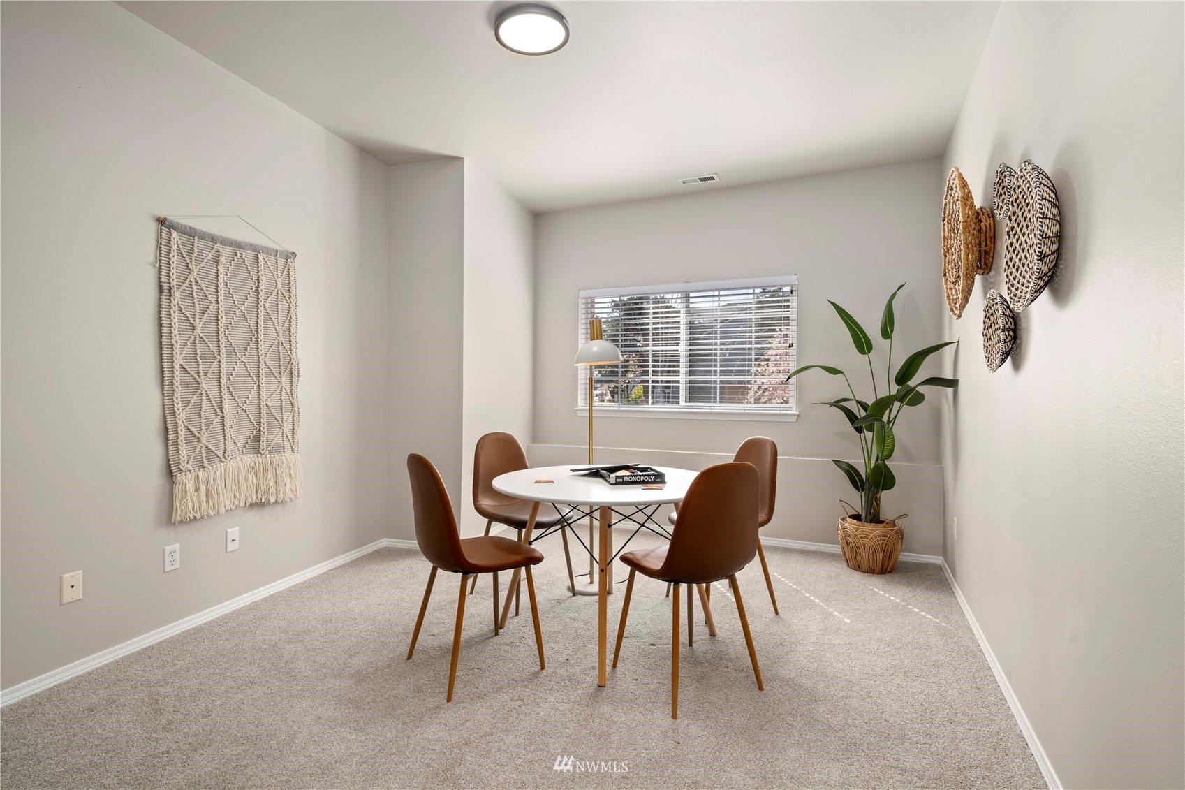 4518 Northeast 7th Place Renton, WA 98059 - Photo 18 of 24 a dining room with furniture and a window