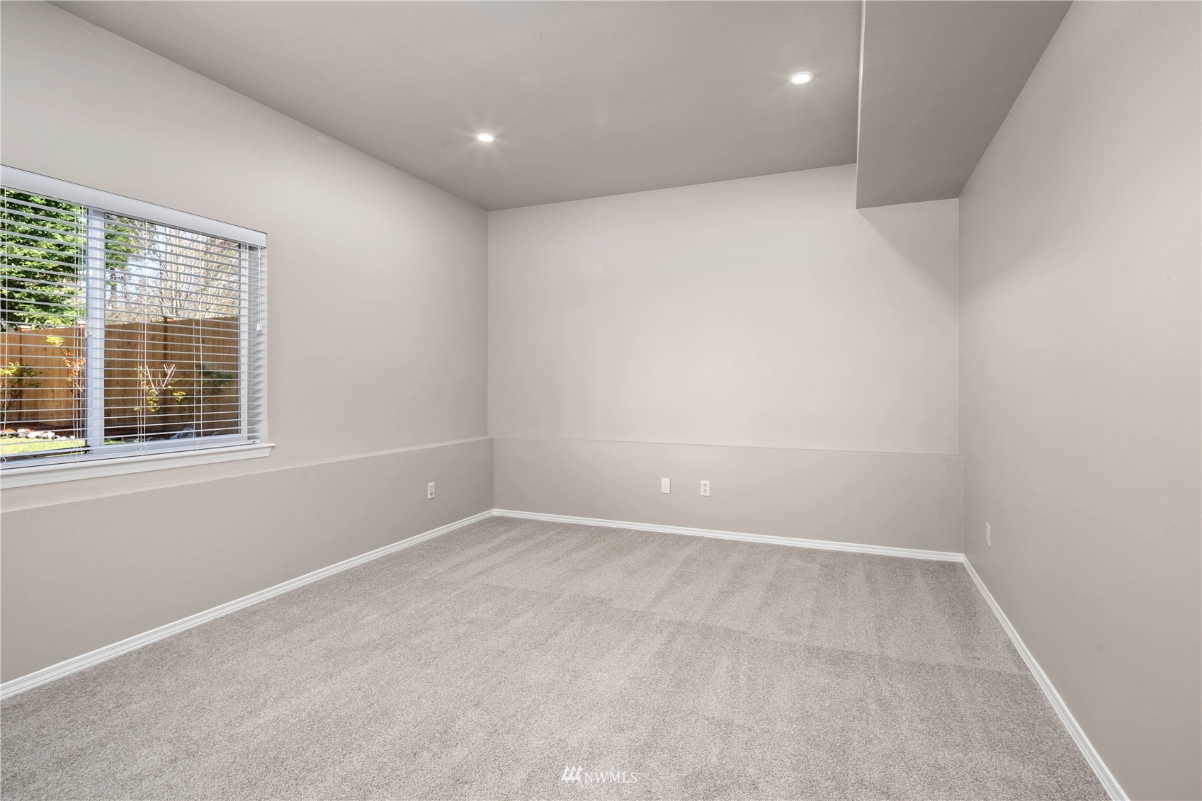 4518 Northeast 7th Place Renton, WA 98059 - Photo 20 of 24 an empty room with a window