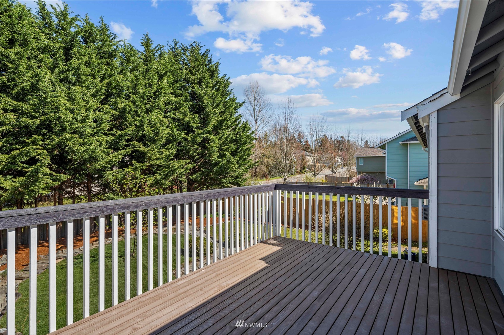 4518 Northeast 7th Place Renton, WA 98059 - Photo 21 of 24 a view of balcony with wooden floor