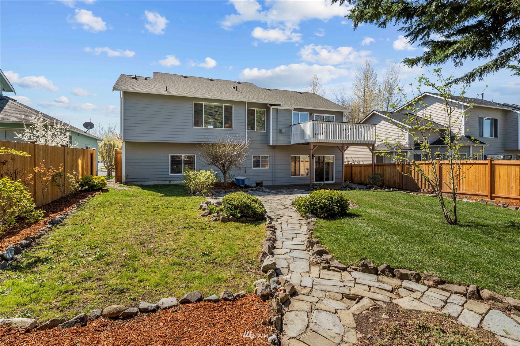 4518 Northeast 7th Place Renton, WA 98059 - Photo 24 of 24 a front view of a house with a yard