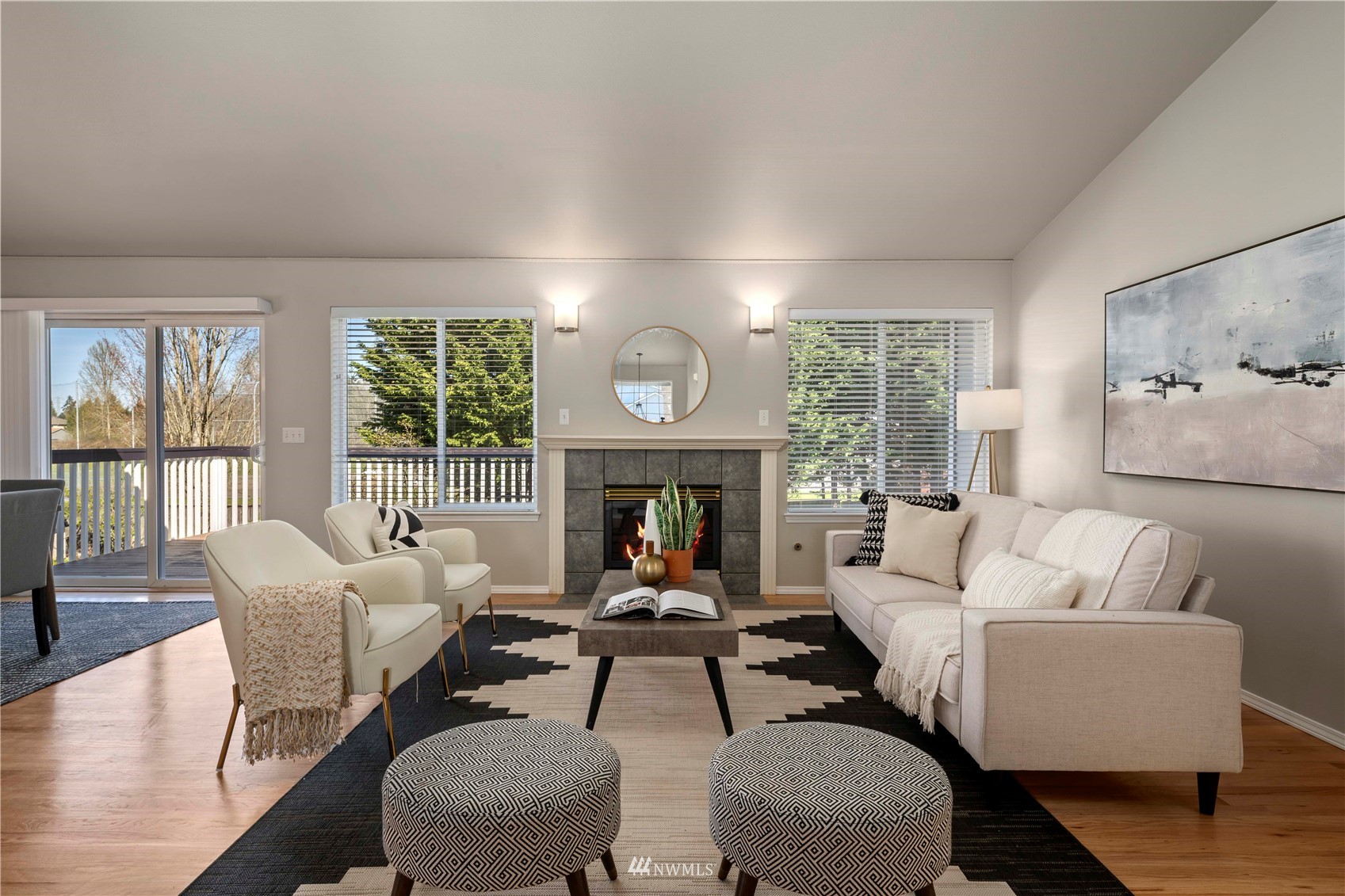 4518 Northeast 7th Place Renton, WA 98059 - Photo 3 of 24 a living room with furniture and a large window