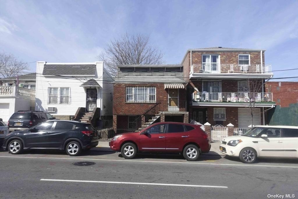 a view of a cars parked in front of a house