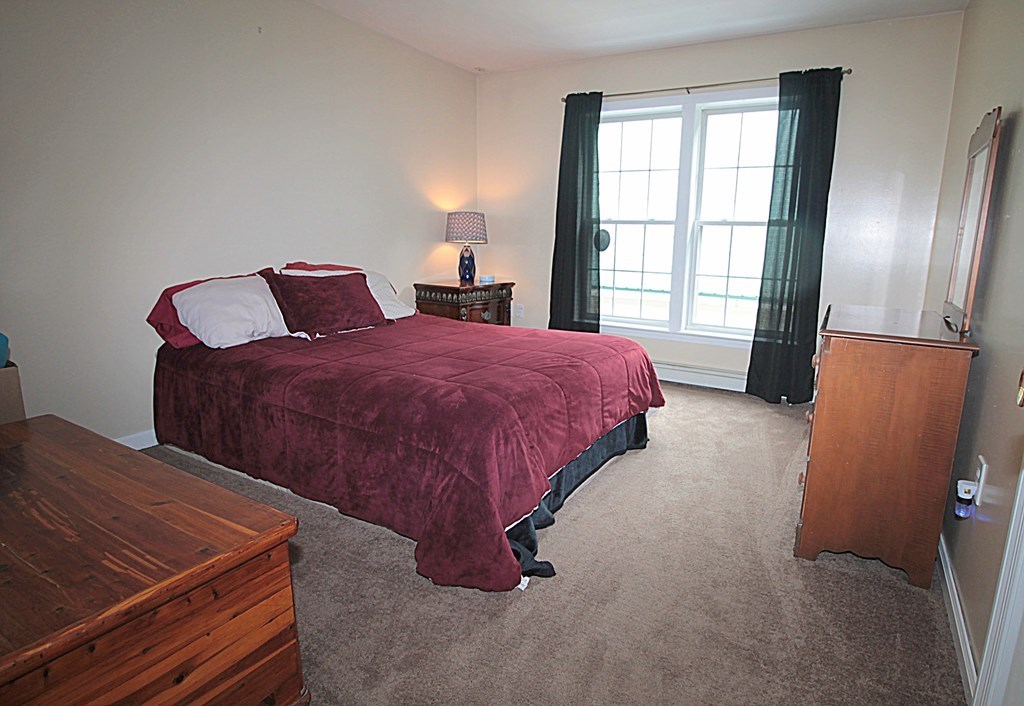 65 High Street Erving, MA 01344 - Photo 17 of 39 a bedroom with bed and window