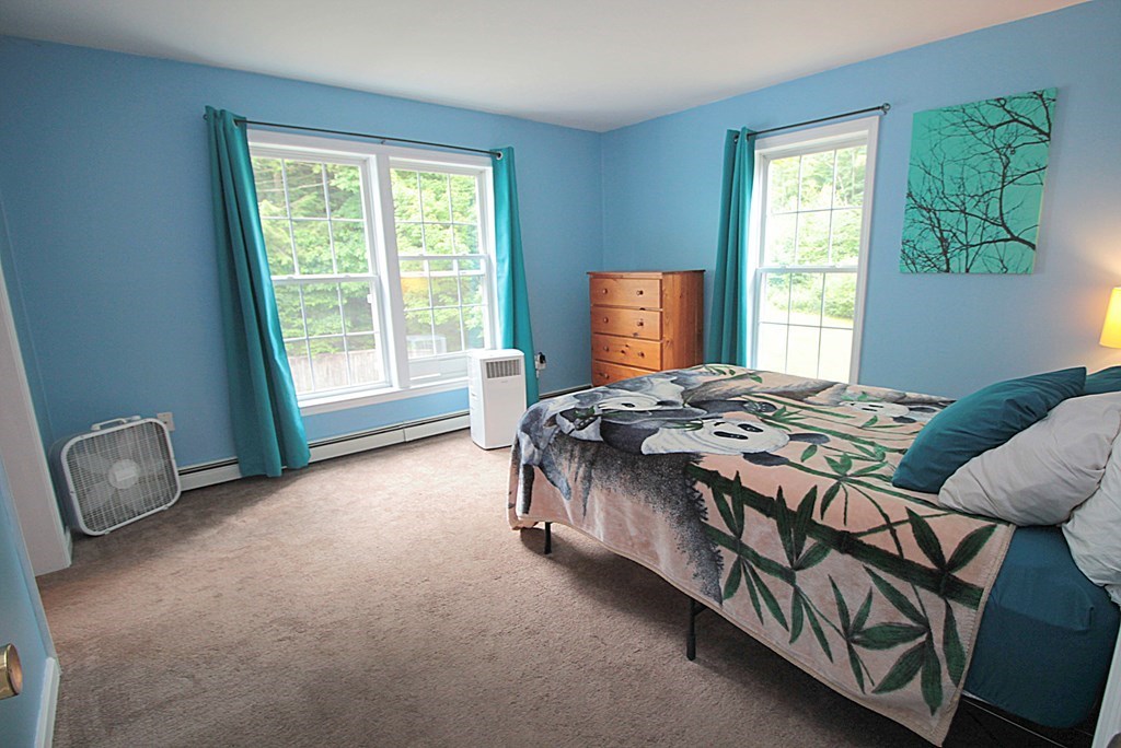 65 High Street Erving, MA 01344 - Photo 21 of 39 a bedroom with a bed and a window