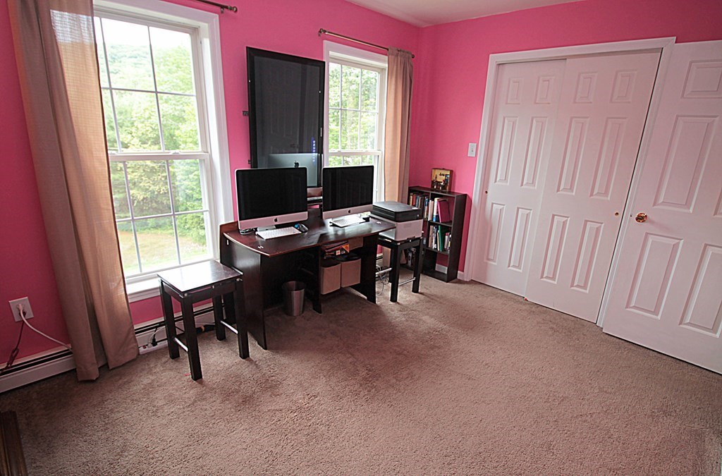 65 High Street Erving, MA 01344 - Photo 24 of 39 a view of a workspace with furniture and a window