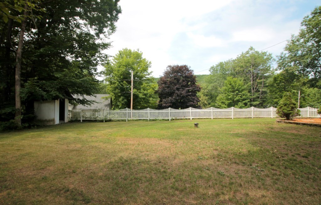 65 High Street Erving, MA 01344 - Photo 33 of 39 a view of an outdoor space and swimming pool