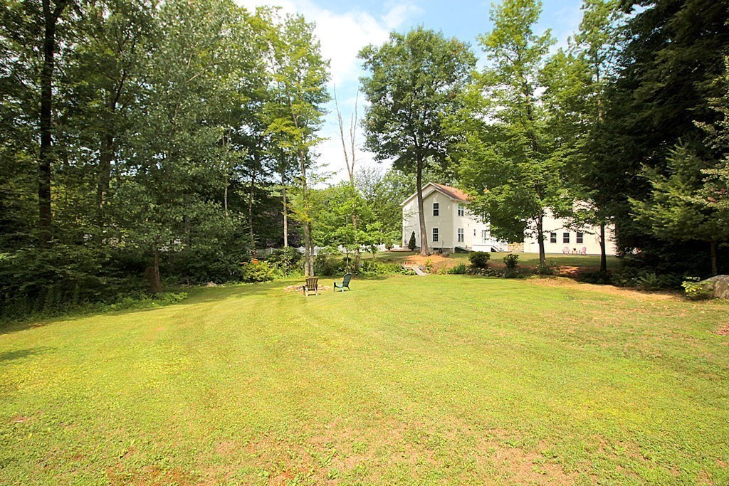 65 High Street Erving, MA 01344 - Photo 35 of 39 a house view with a swimming pool