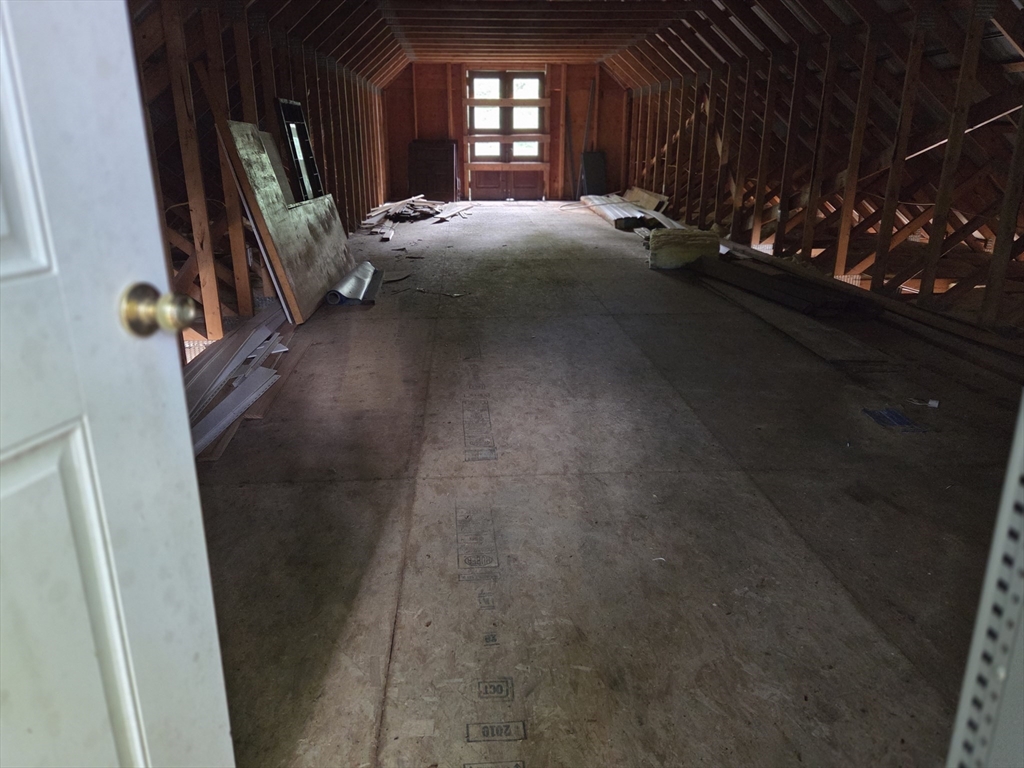65 High Street Erving, MA 01344 - Photo 37 of 39 a view of an empty room with a fireplace