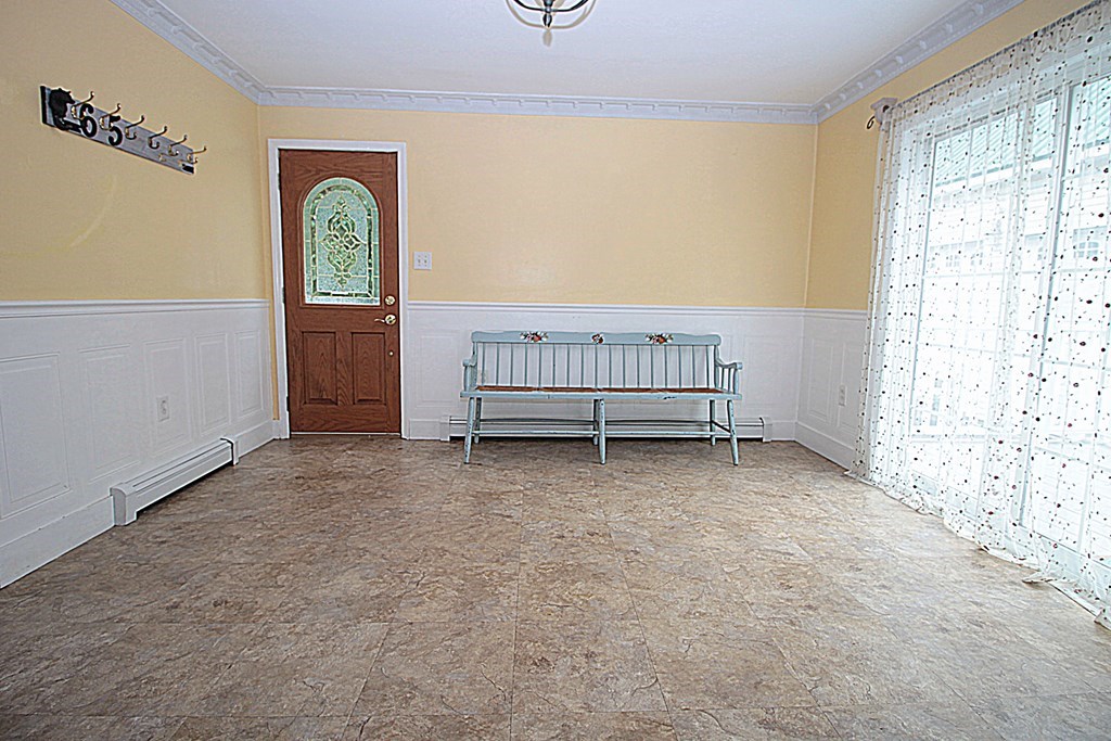 65 High Street Erving, MA 01344 - Photo 4 of 39 an empty room with windows