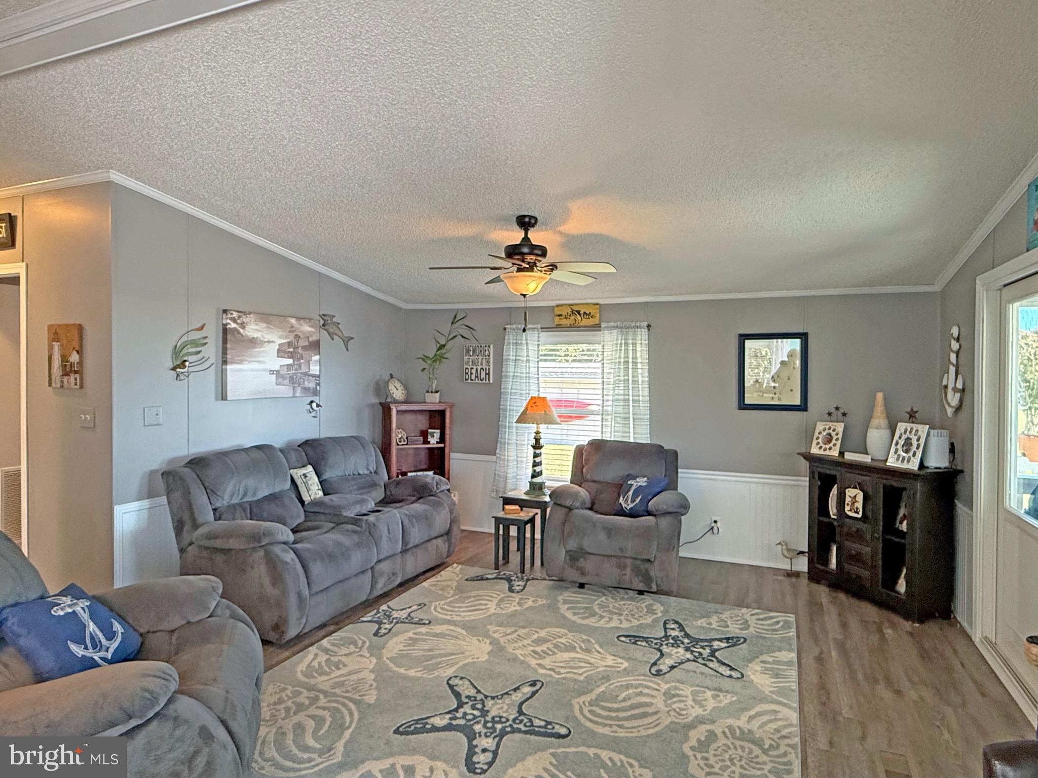 27137 Clipper Road, Unit M55 Millsboro, DE 19966 - Photo 18 of 48 a living room with furniture