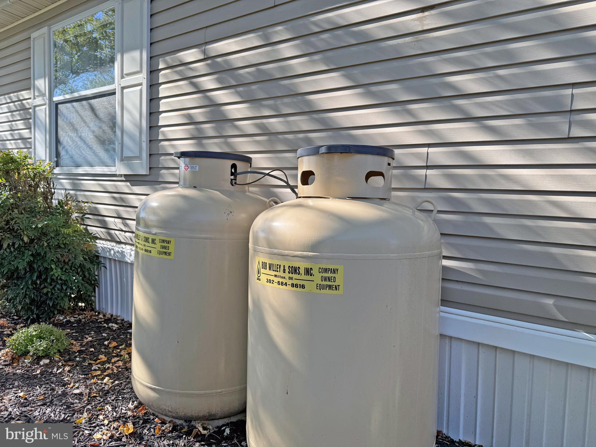 27137 Clipper Road, Unit M55 Millsboro, DE 19966 - Photo 43 of 48 a utility room with washer and dryer