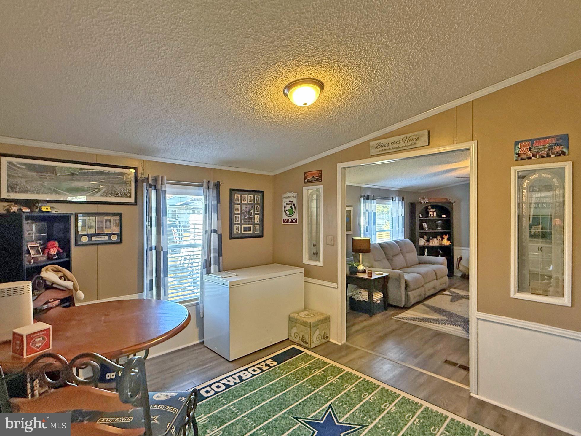 27137 Clipper Road, Unit M55 Millsboro, DE 19966 - Photo 6 of 48 a living room with furniture