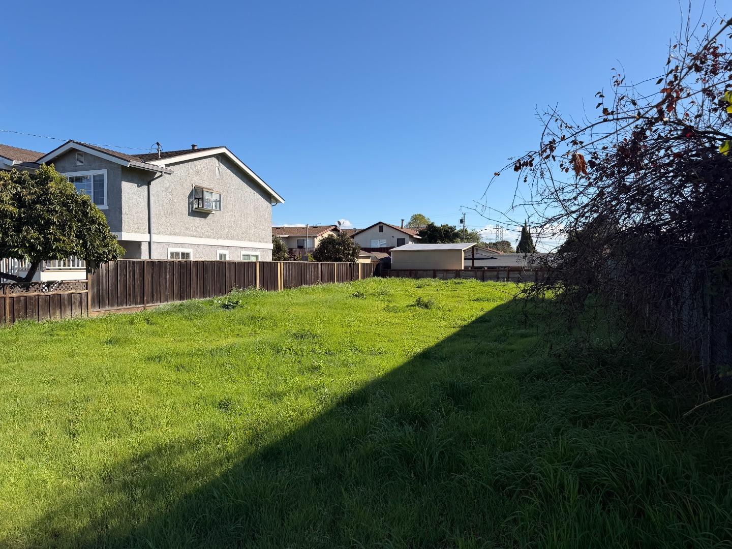 1553 State Street Alviso, CA 95002 - Photo 3 of 6 a view of a house with a yard and sitting area