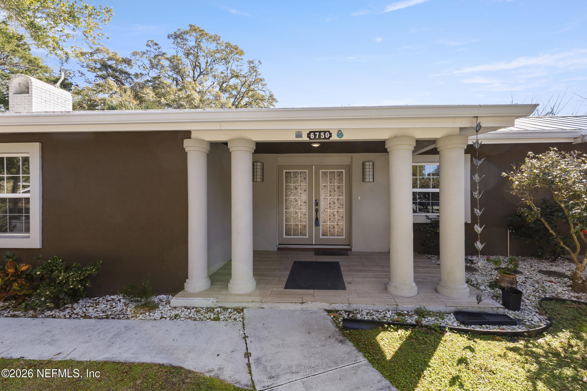 6750 Orkney Road Jacksonville, FL 32211 - Photo 1 of 52 42_front door ext 2