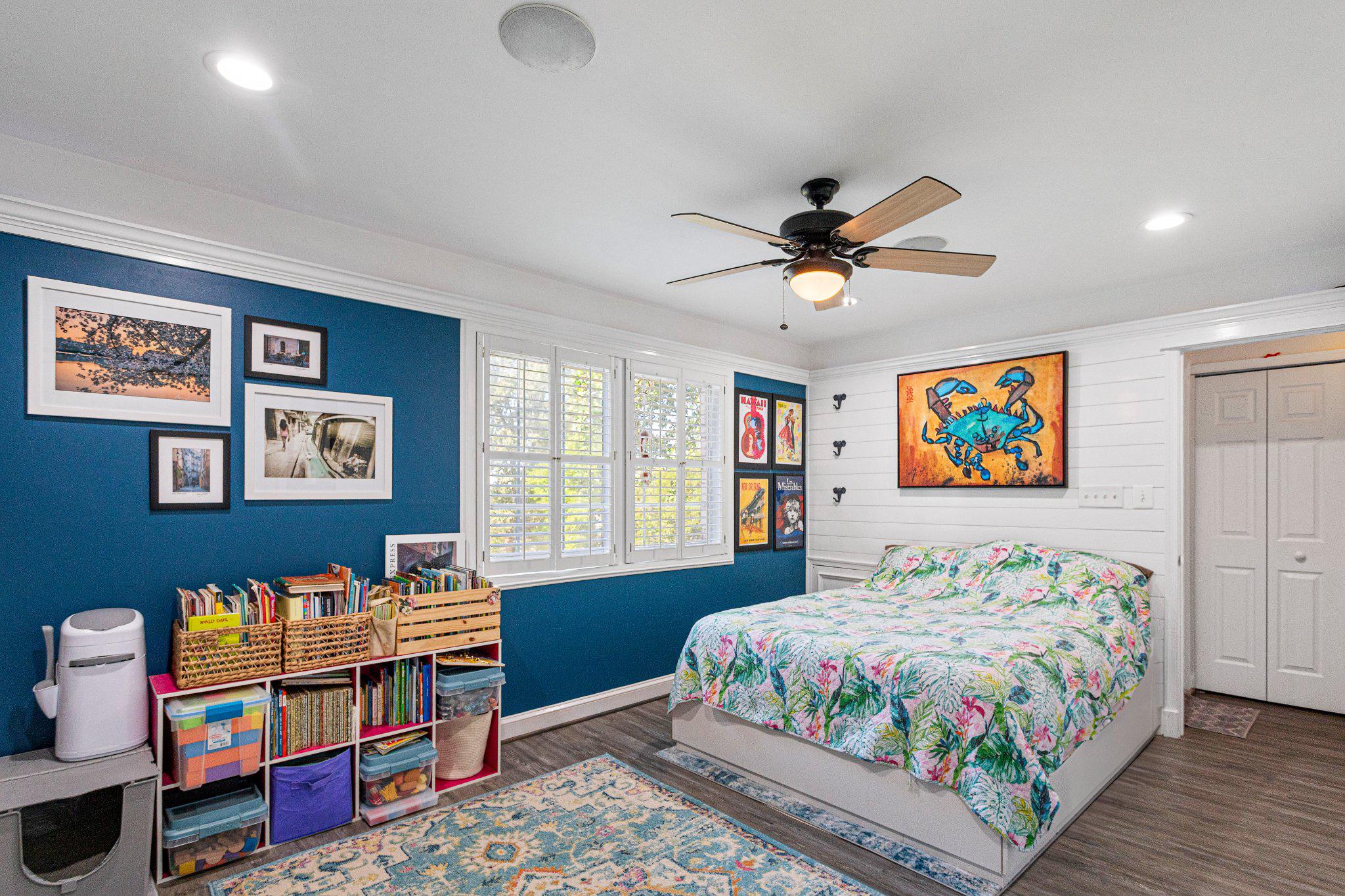 5613 Franconia Road, Unit 303 Alexandria, VA 22310 - Photo 26 of 27 a bedroom with a bed and a chandelier