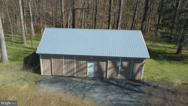 a view of backyard with green space