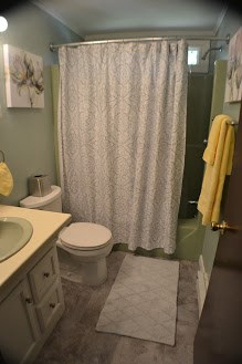 1050 Slocum Road North Kingstown, RI 02874 - Photo 14 of 26 Updated bathroom with a window in the shower.