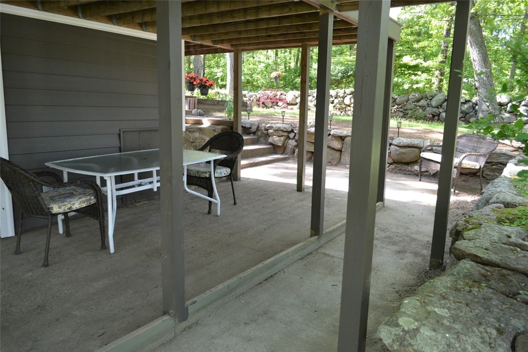 1050 Slocum Road North Kingstown, RI 02874 - Photo 23 of 26 Patio below the deck which can be accessed by the lower level sliding door.