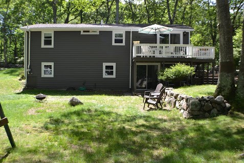 1050 Slocum Road North Kingstown, RI 02874 - Photo 4 of 26 Rear of the home showing new deck and patio below from walk-out lower level.