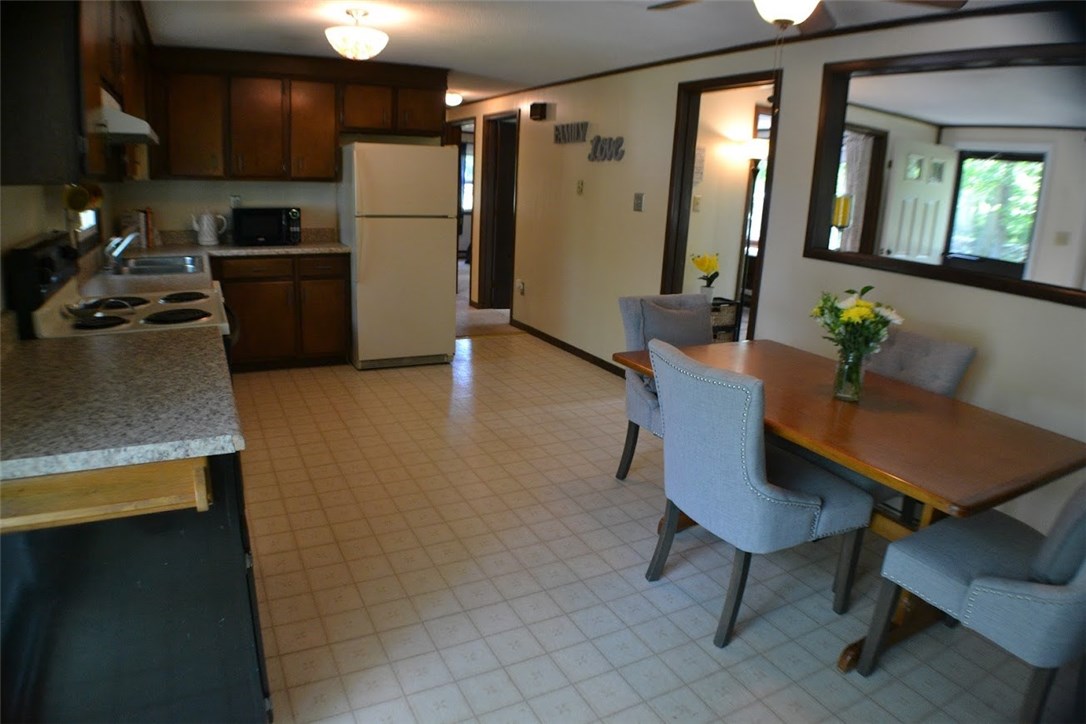 1050 Slocum Road North Kingstown, RI 02874 - Photo 8 of 26 Spacious eat-in kitchen with views to the living room and 3 bedrooms.