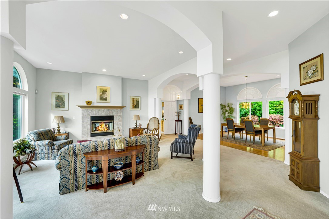 4191 Islander Way Anacortes, WA 98221 - Photo 16 of 40 a living room with furniture and a fireplace