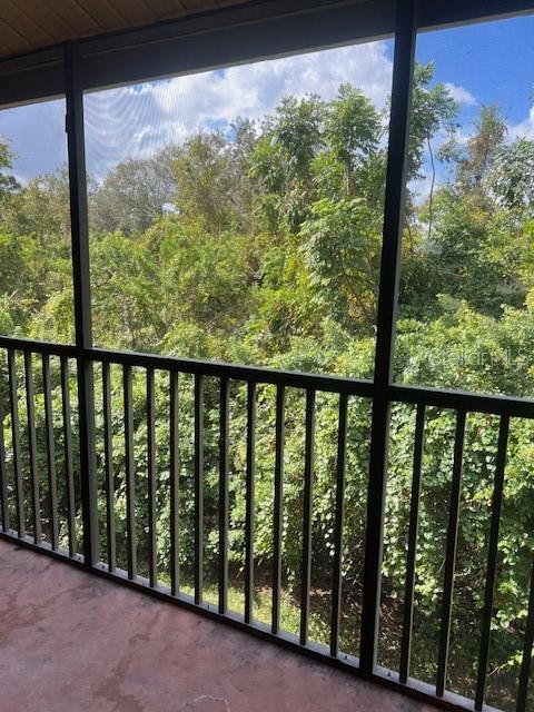 7757 Sugar Bend Drive, Unit 7757 Orlando, FL 32819 - Photo 12 of 30 a view of a porch