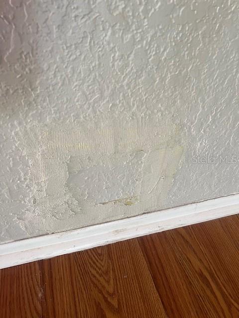 7757 Sugar Bend Drive, Unit 7757 Orlando, FL 32819 - Photo 15 of 30 a view of wooden floor in a bathroom