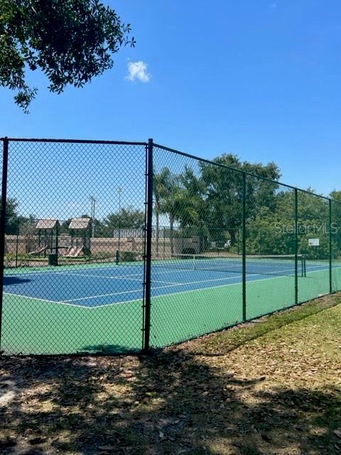 7757 Sugar Bend Drive, Unit 7757 Orlando, FL 32819 - Photo 26 of 30 a view of a yard with a entertaining space
