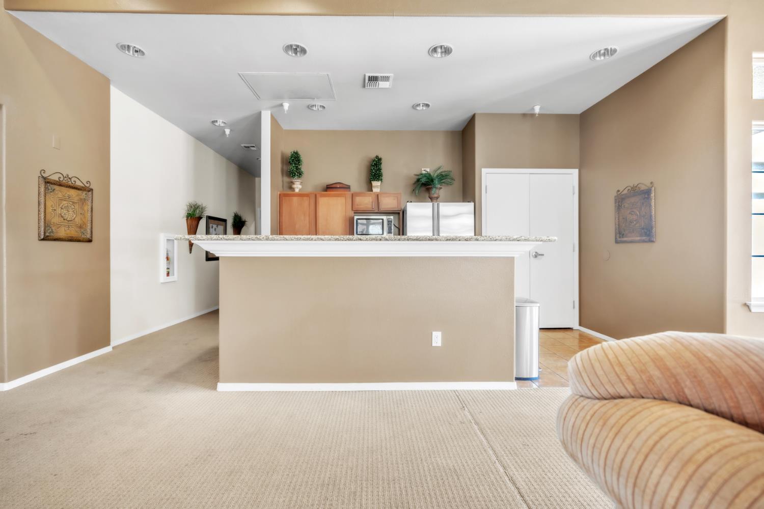 4200 East Commerce Way, Unit 1611 Sacramento, CA 95834 - Photo 31 of 39 a view of kitchen with furniture and refrigerator