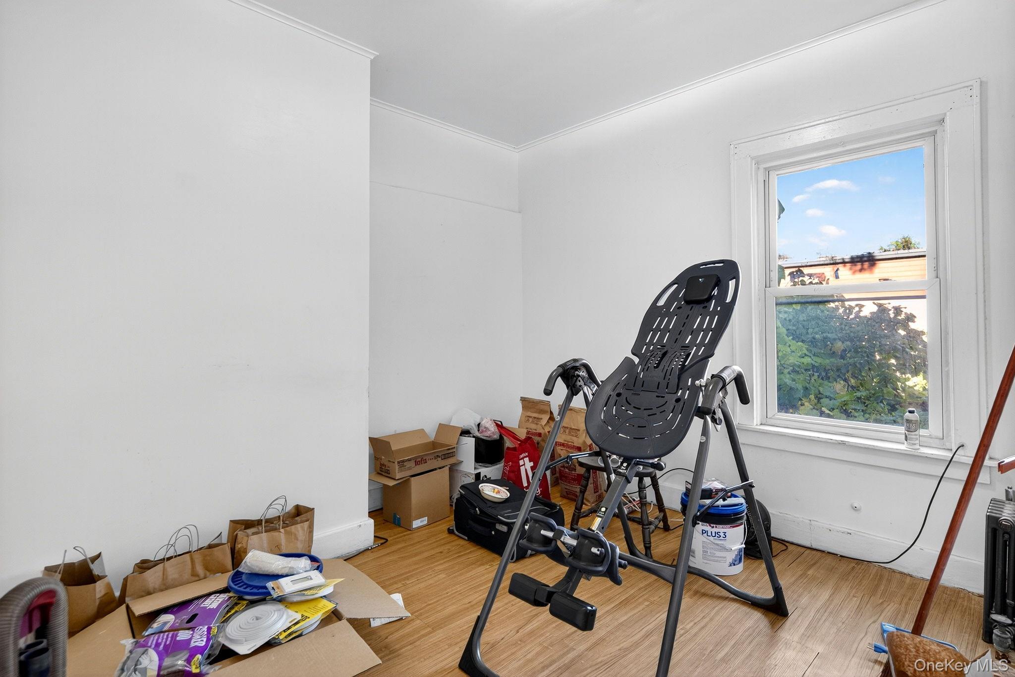 964 State Street Schenectady, NY 12307 - Photo 20 of 24 Exercise area with wood finished floors and ornamental molding