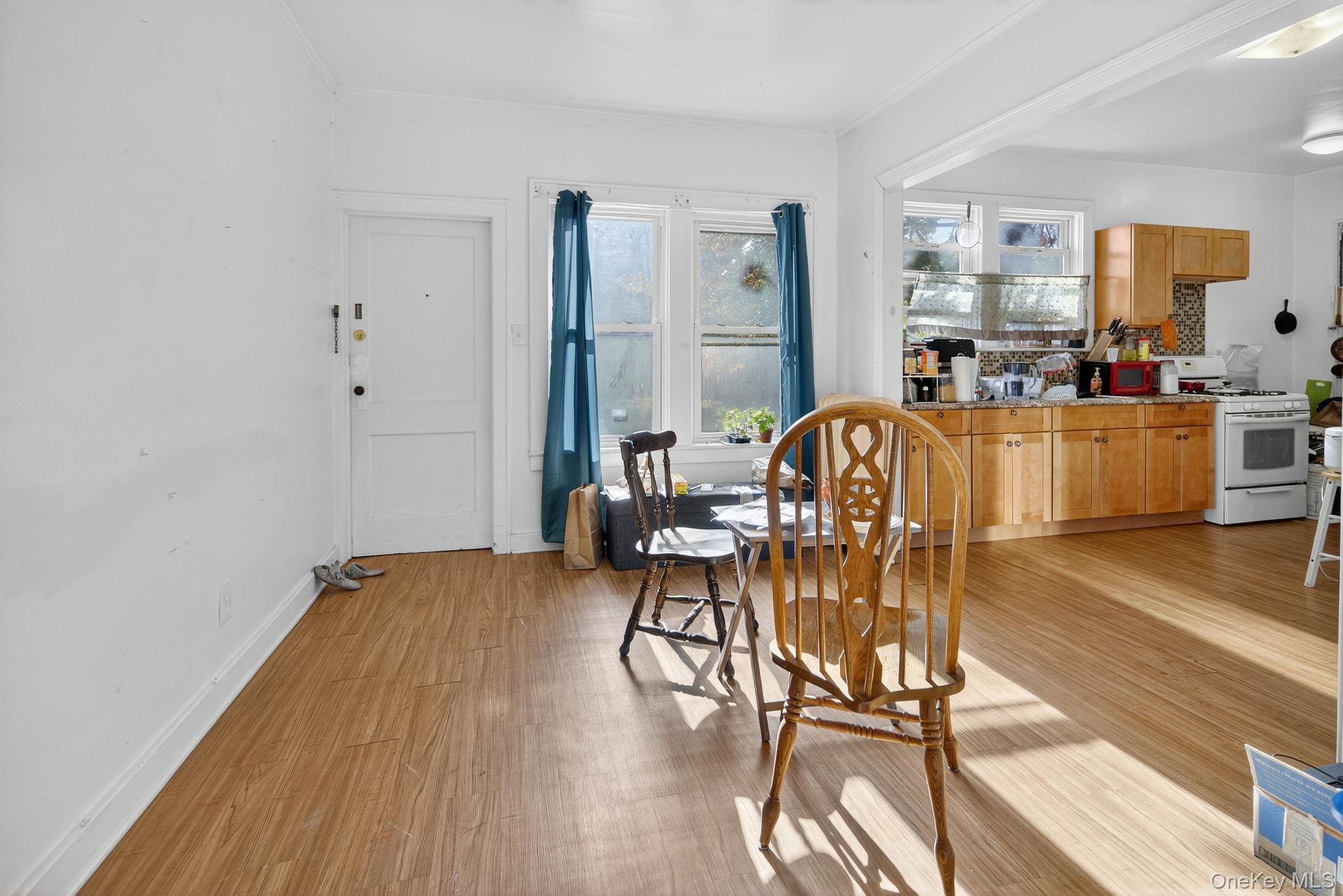 964 State Street Schenectady, NY 12307 - Photo 4 of 24 Dining space with light wood finished floors and baseboards
