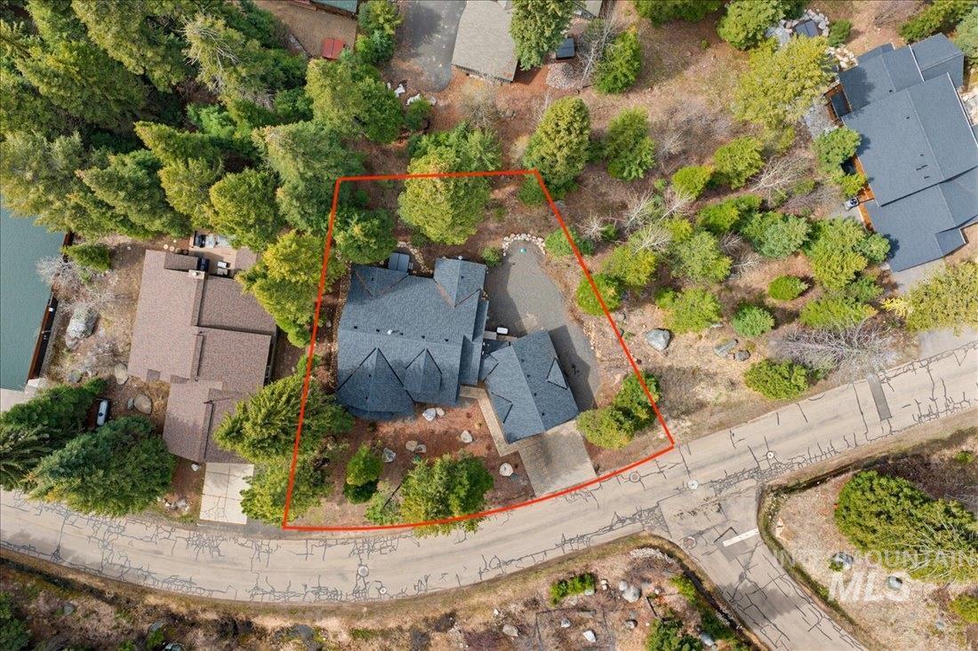 1051 Bitterroot Drive McCall, ID 83638 - Photo 25 of 26 Aerial view of a property featuring a multi-gabled roofline and surrounding mature trees