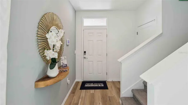 a kitchen with a sink stove and refrigerator