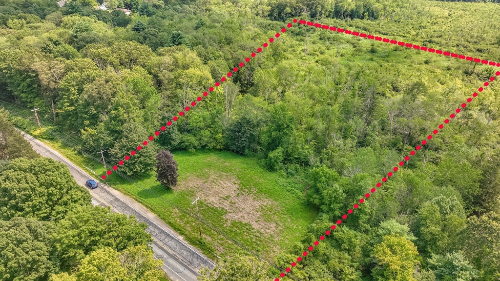 0 Center Street Ludlow, MA 01056 - Photo 2 of 9 a view of a garden with a flower garden