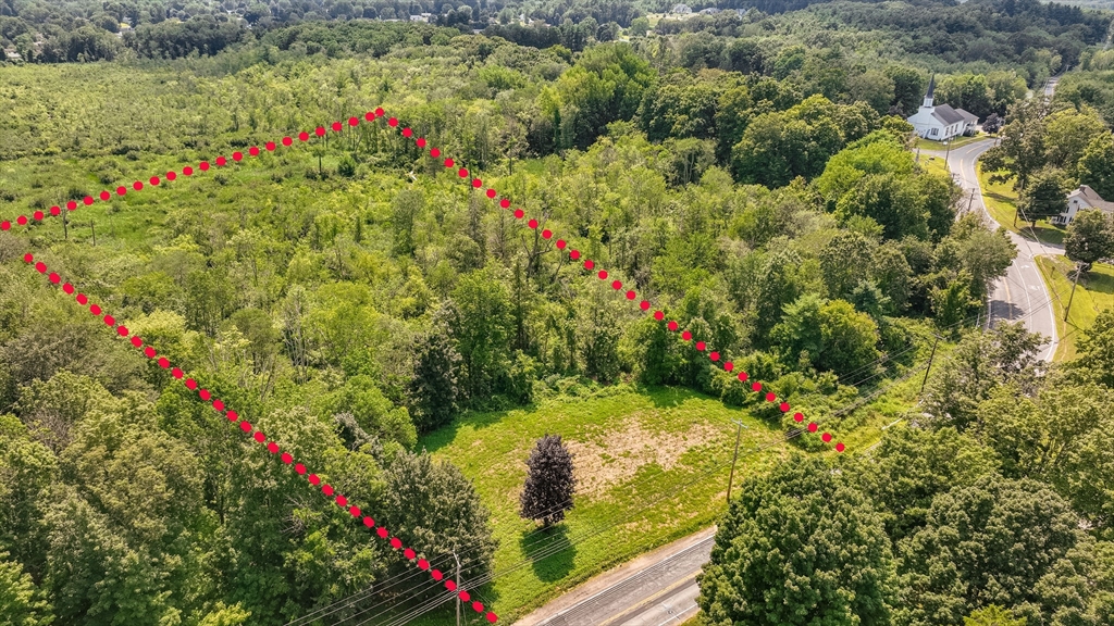 0 Center Street Ludlow, MA 01056 - Photo 3 of 9 a view of a garden with a flower garden