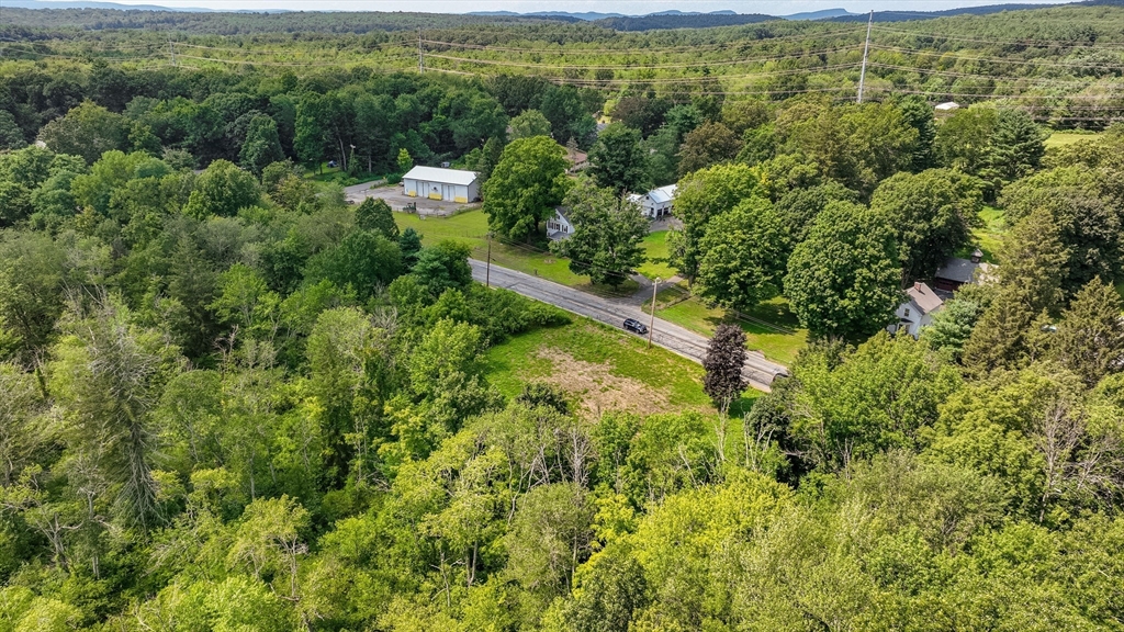 0 Center Street Ludlow, MA 01056 - Photo 6 of 9 an aerial view of residential houses with outdoor space and trees