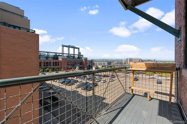 a view of balcony with furniture