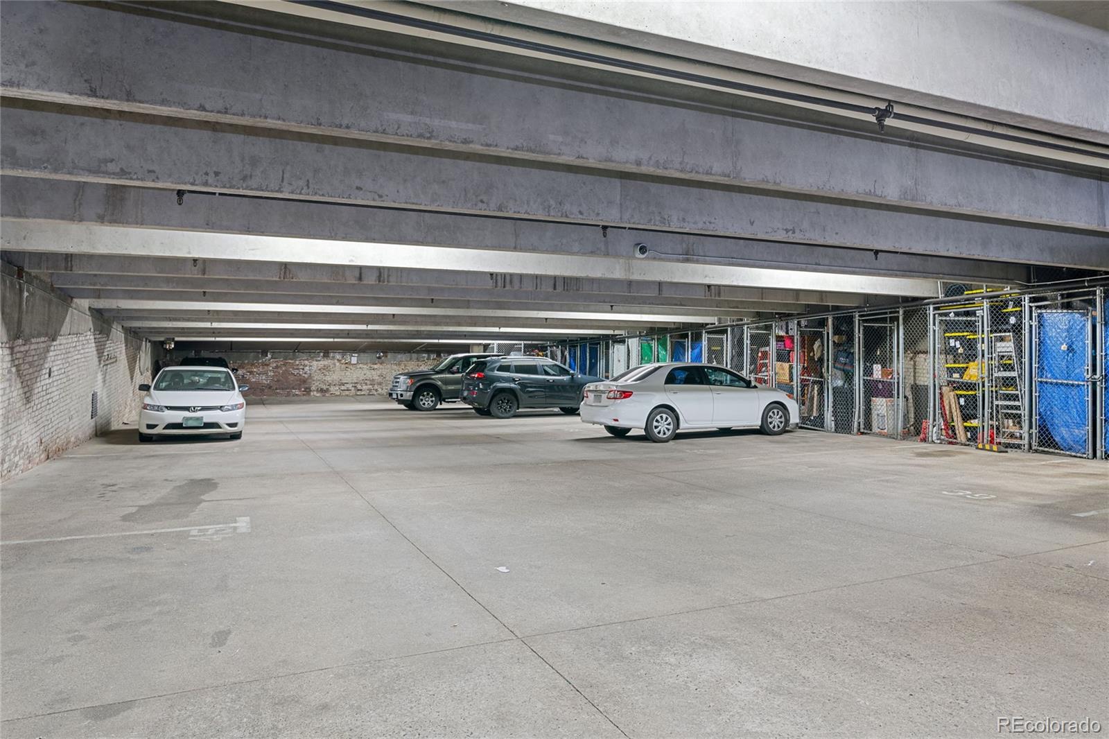 2261 Blake Street, Unit 4D Denver, CO 80205 - Photo 10 of 15 a view of car parking