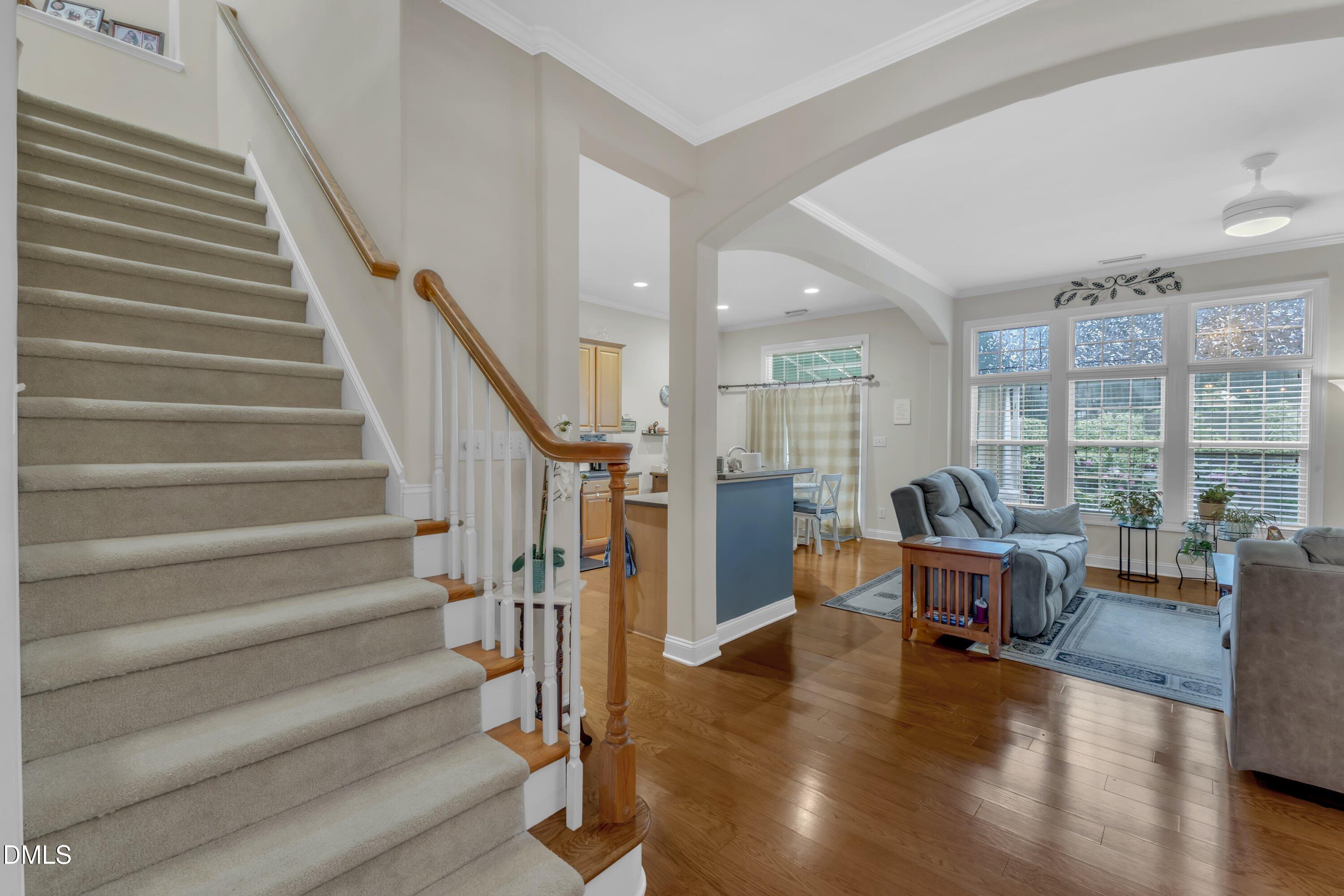 12227 Orchardgrass Lane Raleigh, NC 27614 - Photo 11 of 46 a view of entryway and hall with wooden floor
