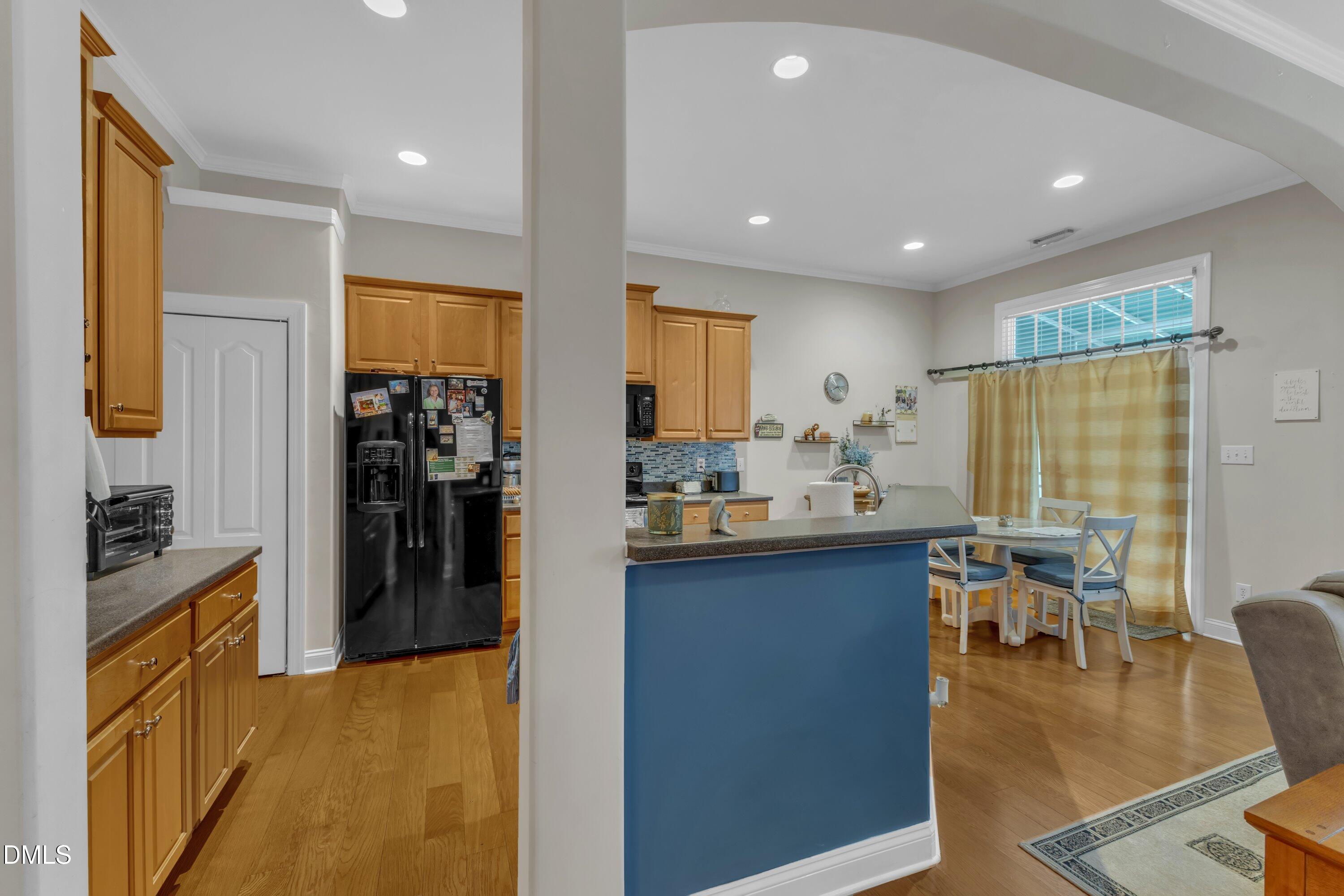 12227 Orchardgrass Lane Raleigh, NC 27614 - Photo 17 of 46 a kitchen with lots of counter top space and stainless steel appliances